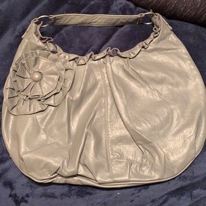 Gray faux leather shoulder bag with flower detail